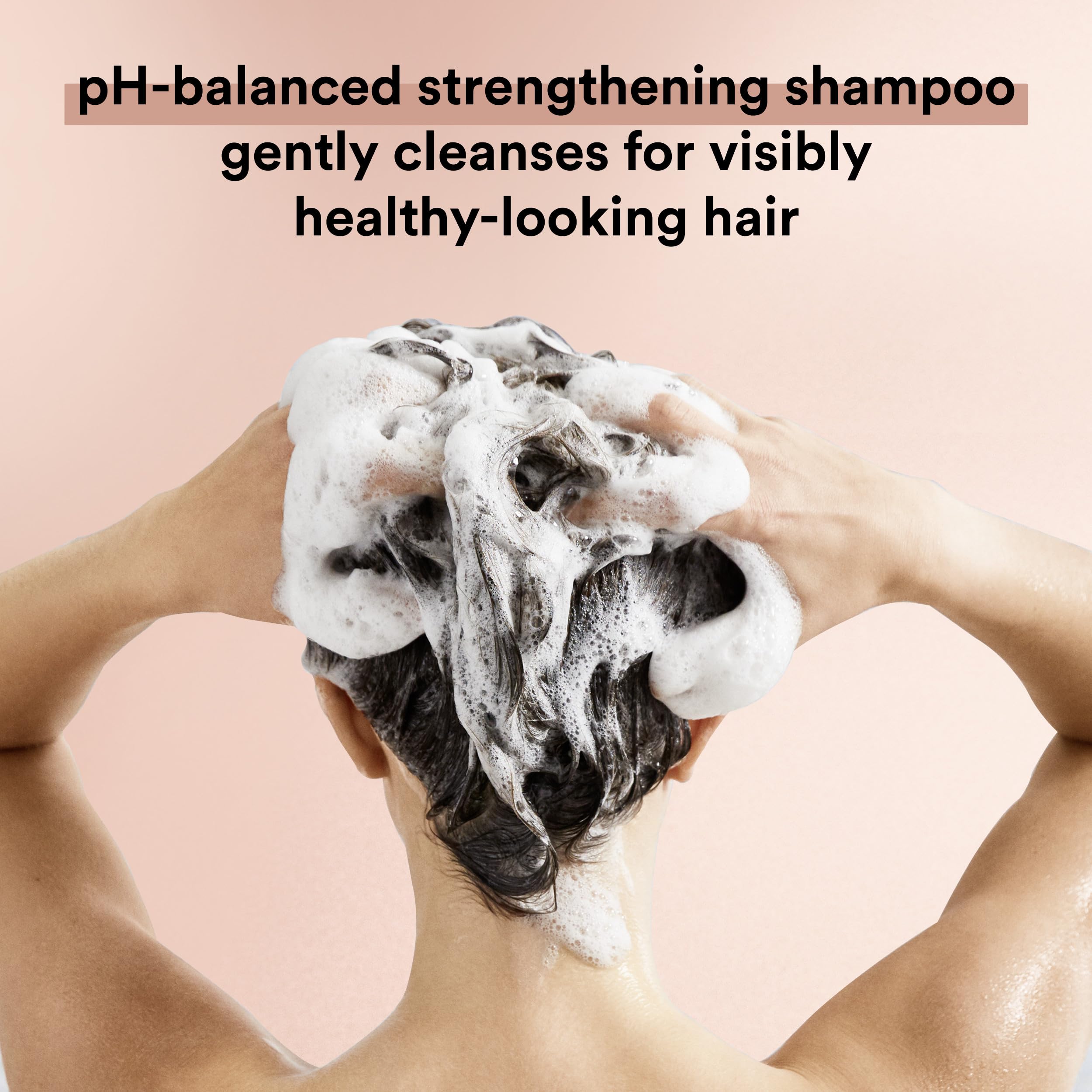 Suave Keratin Infusion shampoo lather close-up shows cleansing and moisture.