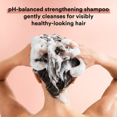 Suave Keratin Infusion shampoo lather close-up shows cleansing and moisture.