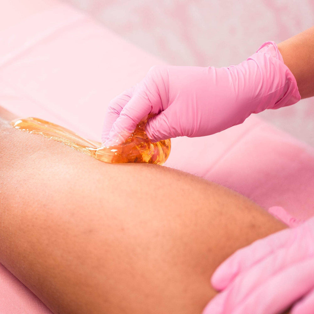 Sugaring NYC paste applied to underarms for quick, gentle hair removal