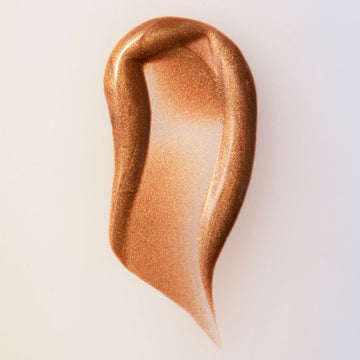 Gotas Bronceadoras de Summer Fridays, aplicación en rostro para hidratación suave.