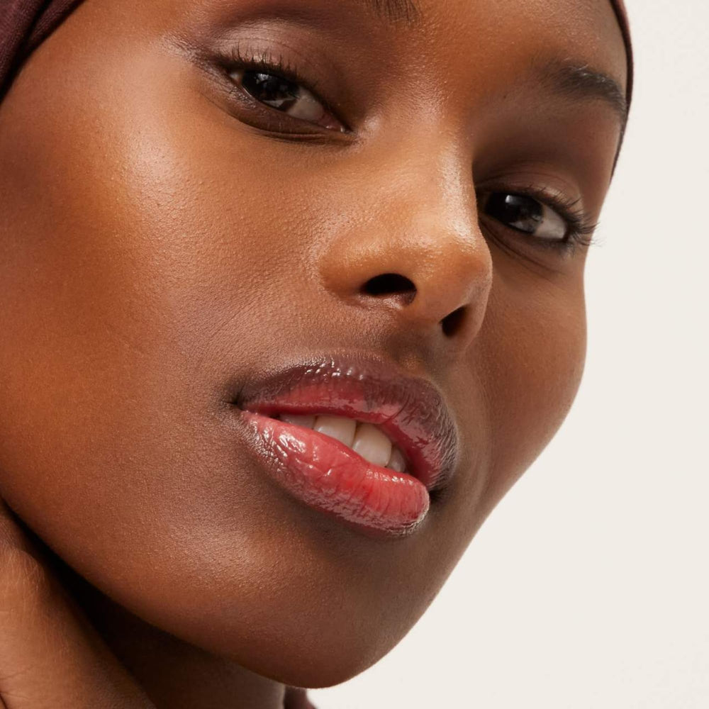 Baume Summer Fridays teinte Poppy utilisée en retouche lèvres