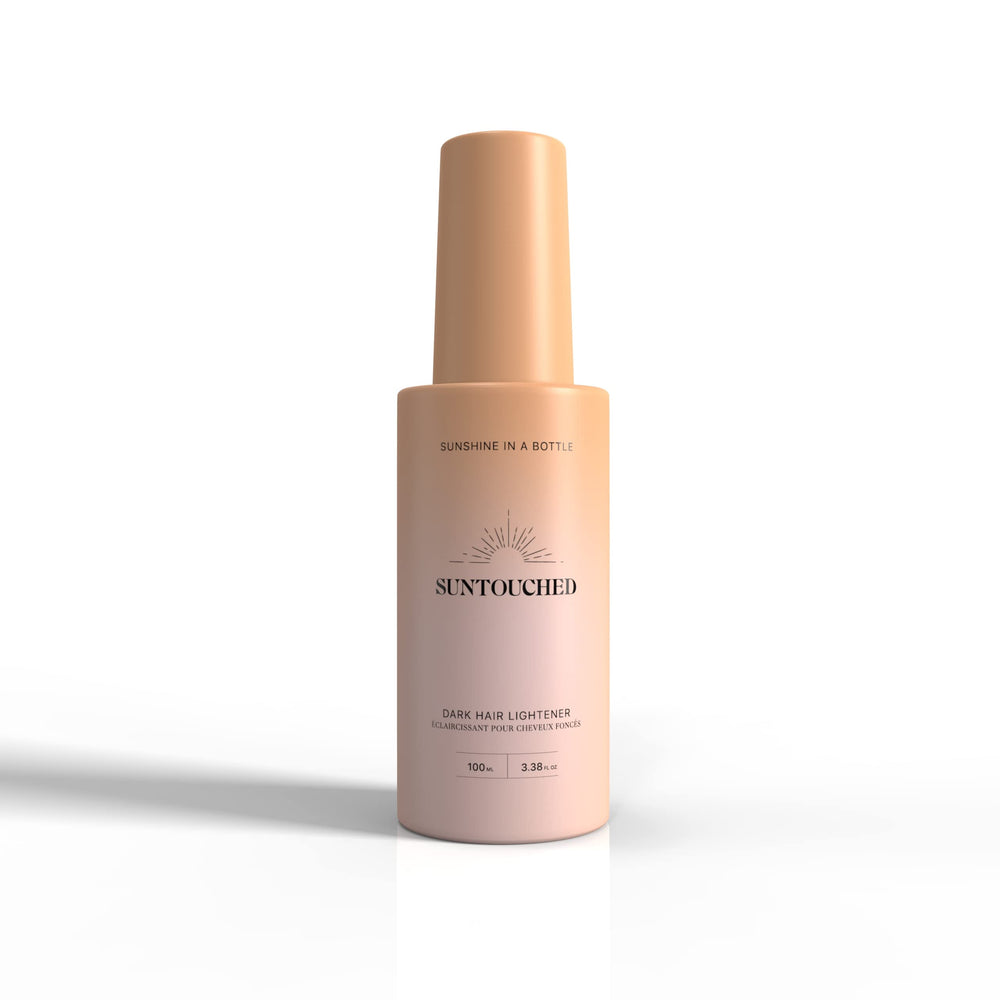 Suntouched iluminador solar en botella para cabello oscuro, ofrece brillo natural.