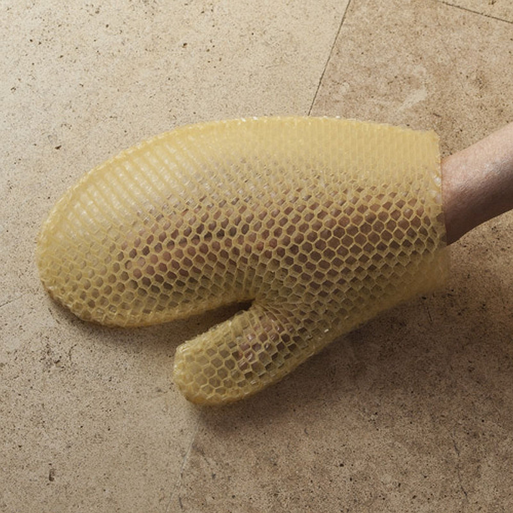 Texture nidabeille Supracor, gant exfoliant efficace pour peau douce.
