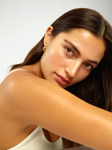 Tan-Luxe The Body: complejo de cafeína para firmeza de la piel.