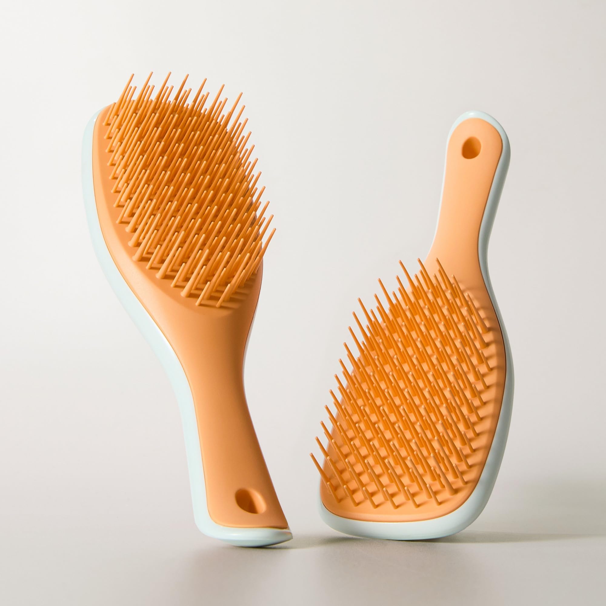 Tangle Teezer Ultimate Desenredador en azul hielo y naranja dulce para viaje