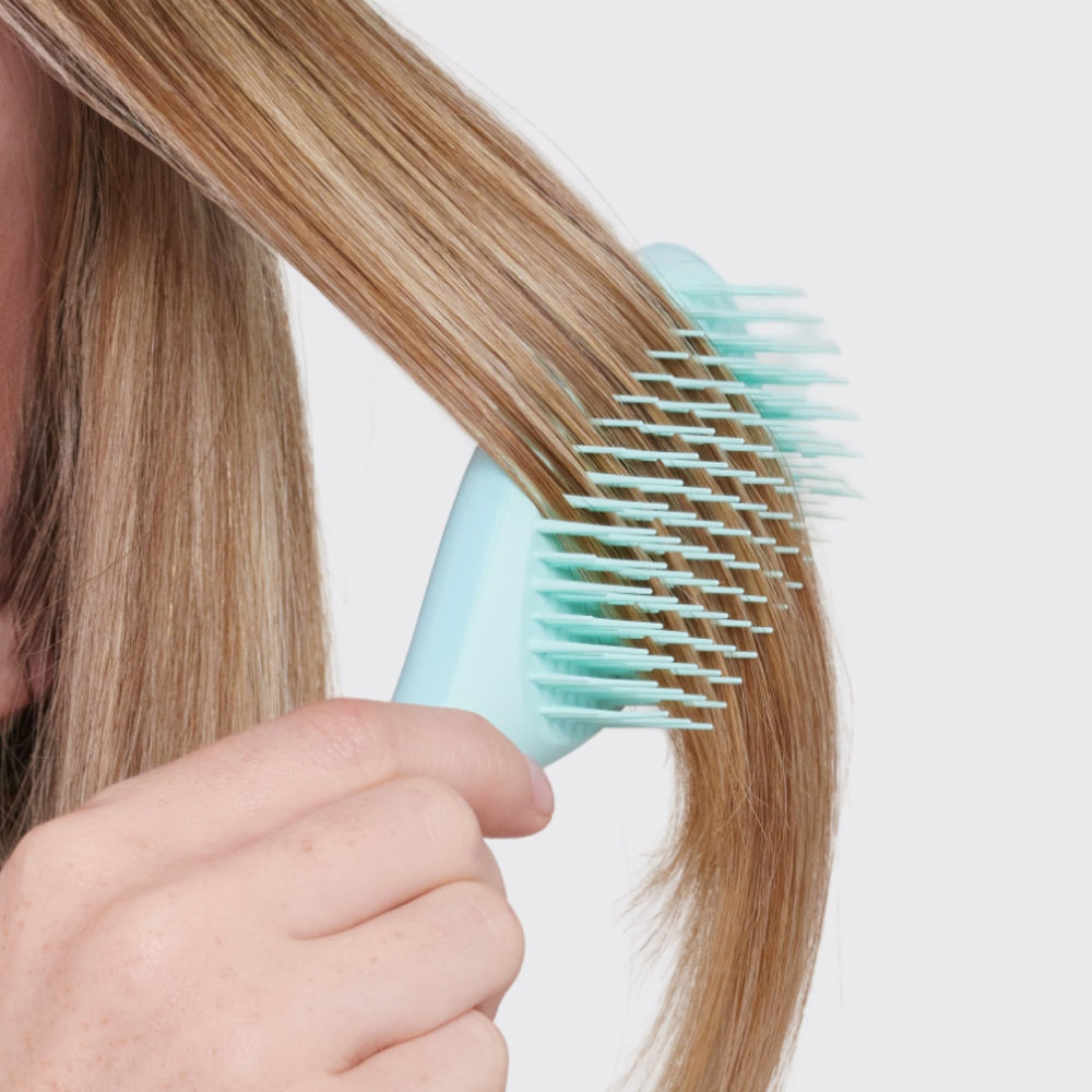 Tangle Teezer cepillo portátil, ideal para viajes y bolso.