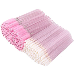 Cepillo para pestañas Tbestmax con mango cristal rosado, ideal para peinar y separar.