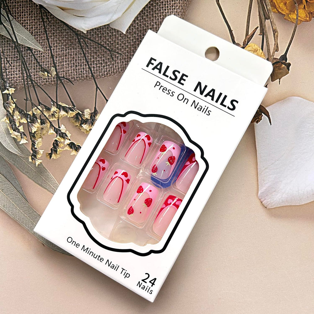 Kit incluido de uñas postizas de fresa para manicura en casa.