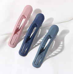 Clip de pelo Tergy multicolor con 6 piezas para looks variados.