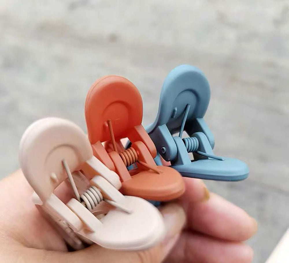 Clip de pelo Tergy dientes curvos para peinados firmes sin deslizamiento.