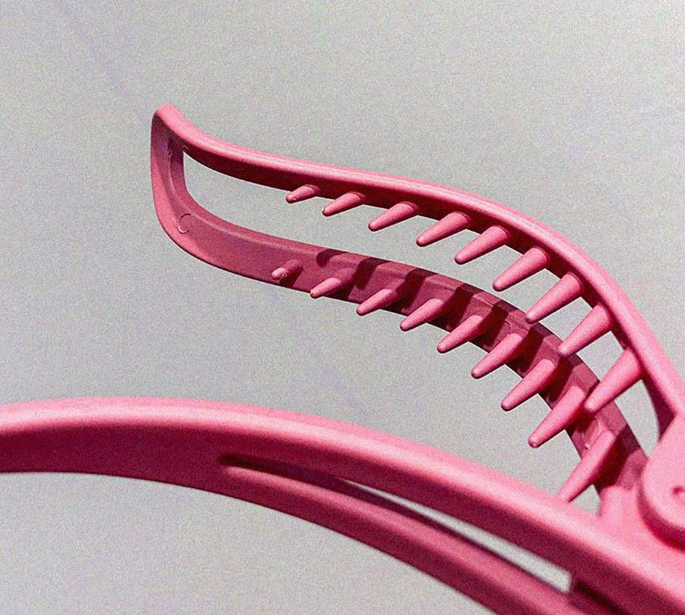 Clip de pelo Tergy colorido para combinar estilos y accesorios.