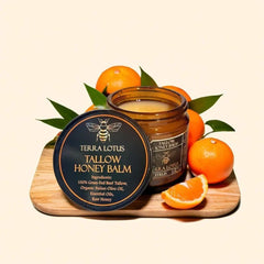 Terra Lotus ingredients—beef tallow, olive oil, raw honey—on wood background.