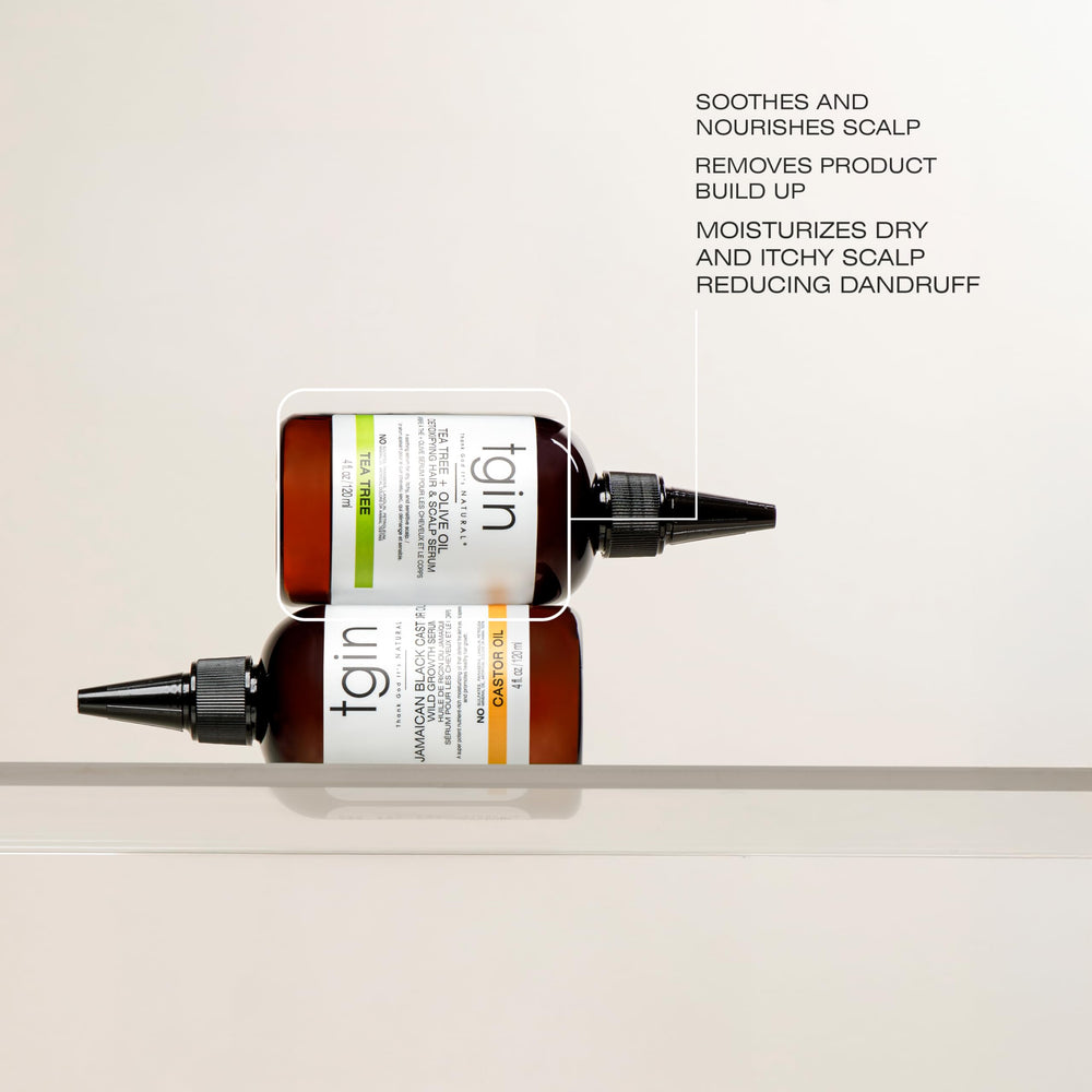 Aplicación del serum tgin en el cuero cabelludo para calmar irritaciones y nutrir.