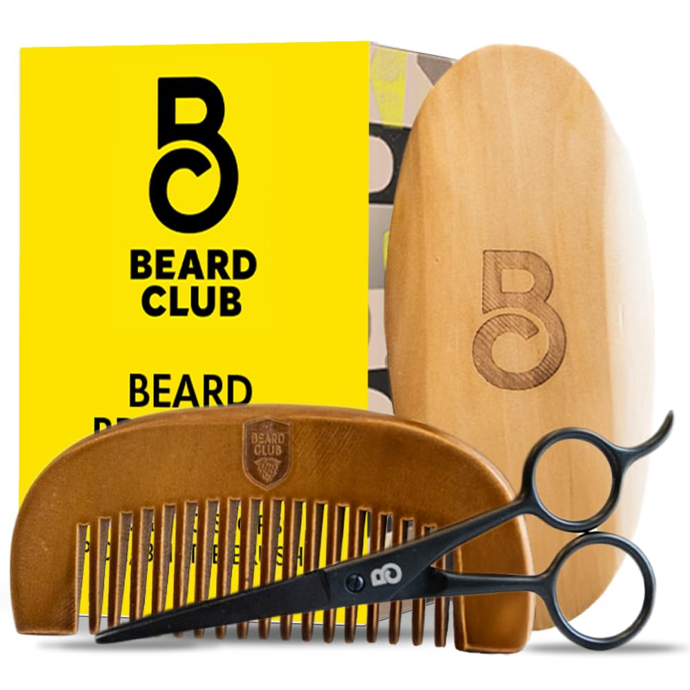 The Beard Club boar bristle brush for even oil distribution and shine.