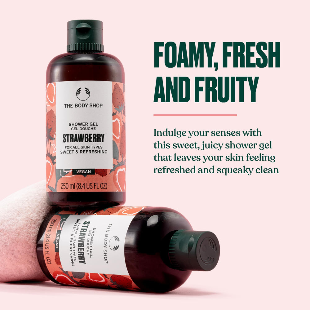 The Body Shop botella de gel de ducha fresa, vertido elegante y tono rosado