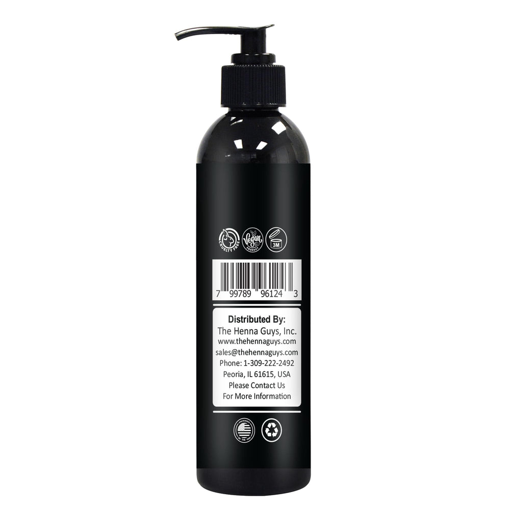 The Henna Guys bottle shown in a tidy bathroom, promoting a comfortable daily shave.