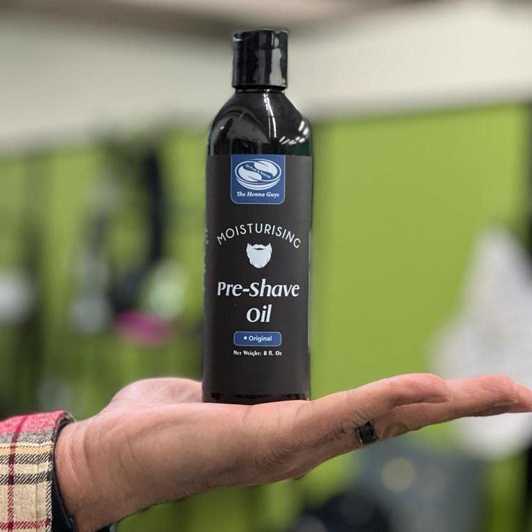 Close-up of the easy-pour cap on The Henna Guys pre-shave oil.