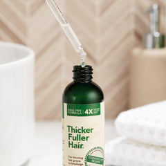 Thicker Fuller Hair: aceite de café verde prensado en frío para un cuero cabelludo estimulado.