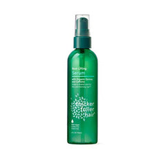 Sérum Thicker Fuller Hair en la botella verde para levantar la raíz