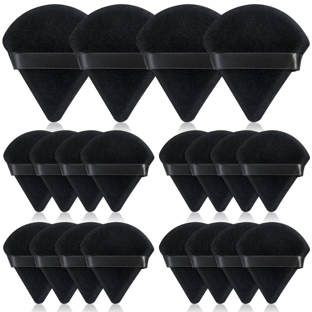 Esponja triangular Thrilez para polvo negro, suave y uniforme al aplicar.