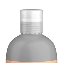 TIGI Bed Head Moisture Maniac: textura cremosa en la mano, hidratación inmediata