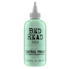 Serum TIGI Bed Head Control Freak en bote: controla el frizz para rizos definidos.