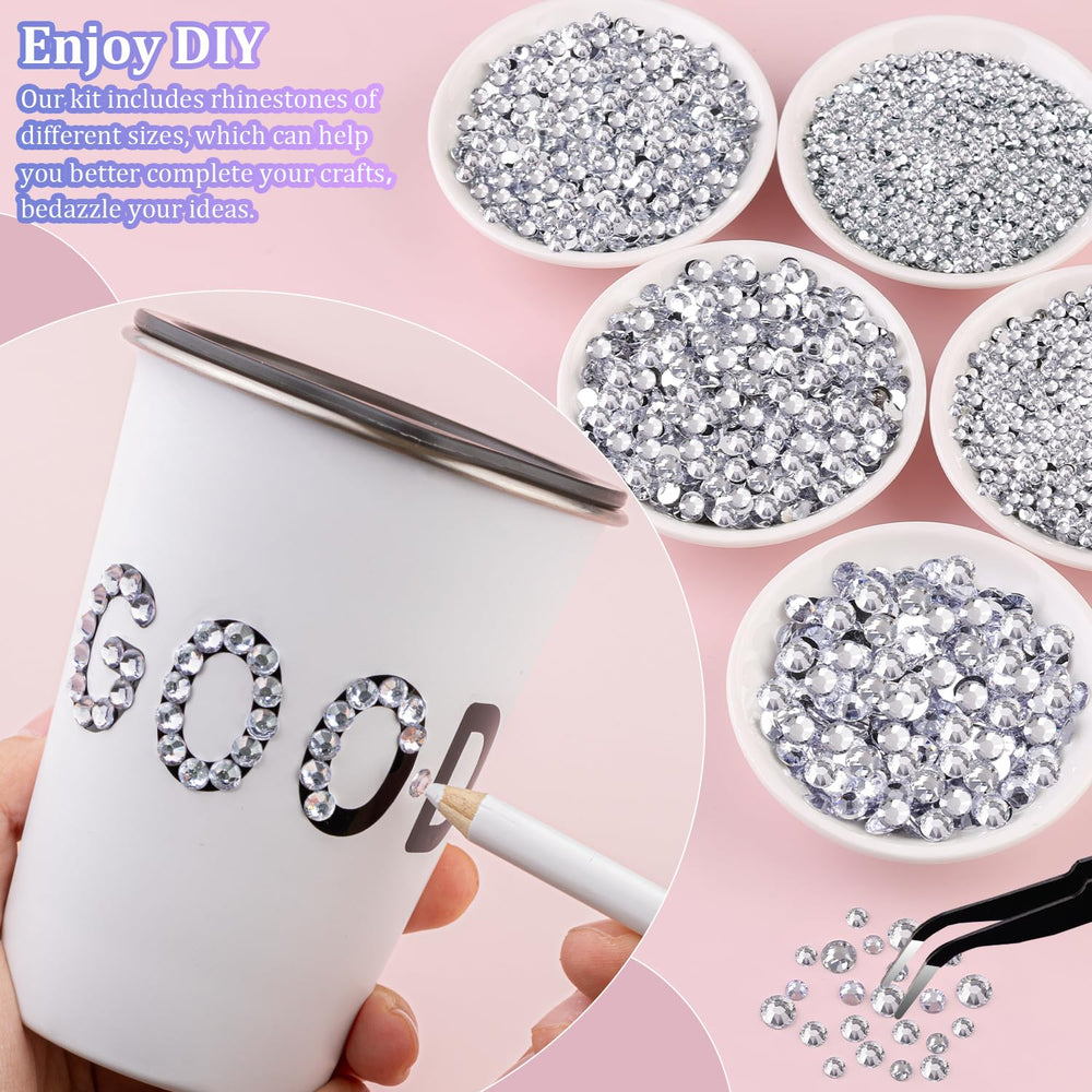 TINKRSTUFF pickup pen and tweezers for precise rhinestone placement.