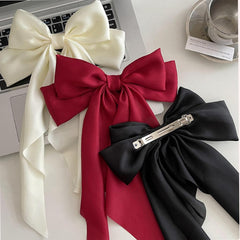 Lazo con cola larga Tobeffect, broche estable para cabello fino.