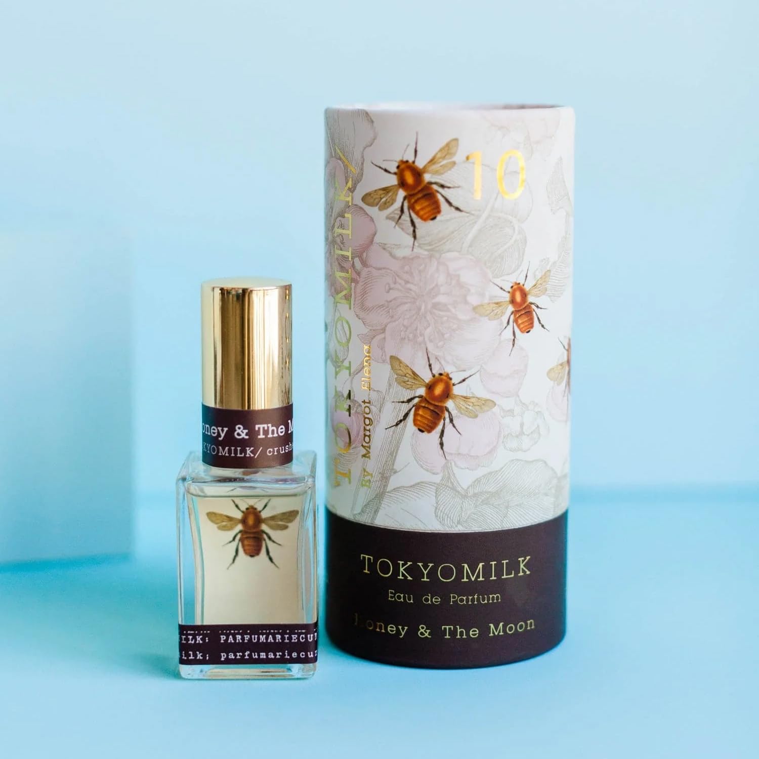 TOKYOMILK Miel y la Luna: empaque de cristal con abejas, aspecto lujoso.