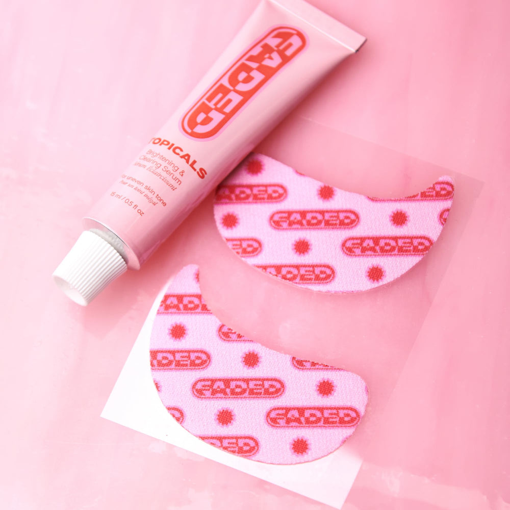 Topicals Faded under eye mask in-use cooling moment for refresh.