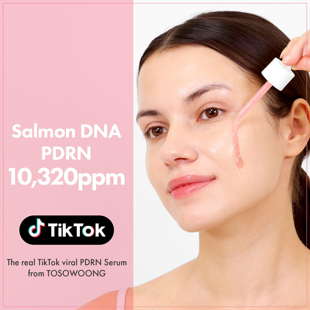 Empaque rosado del sérum con diseño limpio y práctico.