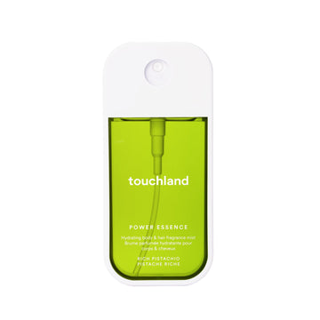 Touchland Bruma Corporal Pistacho en botella para piel suave.
