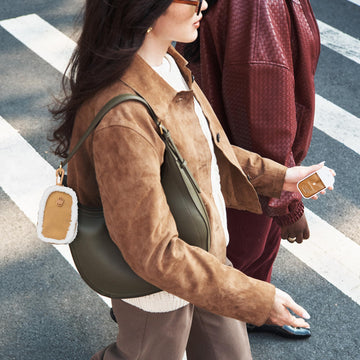 Touchland Touchette detalle cierre, accesorio con cremallera para tus objetos esenciales.
