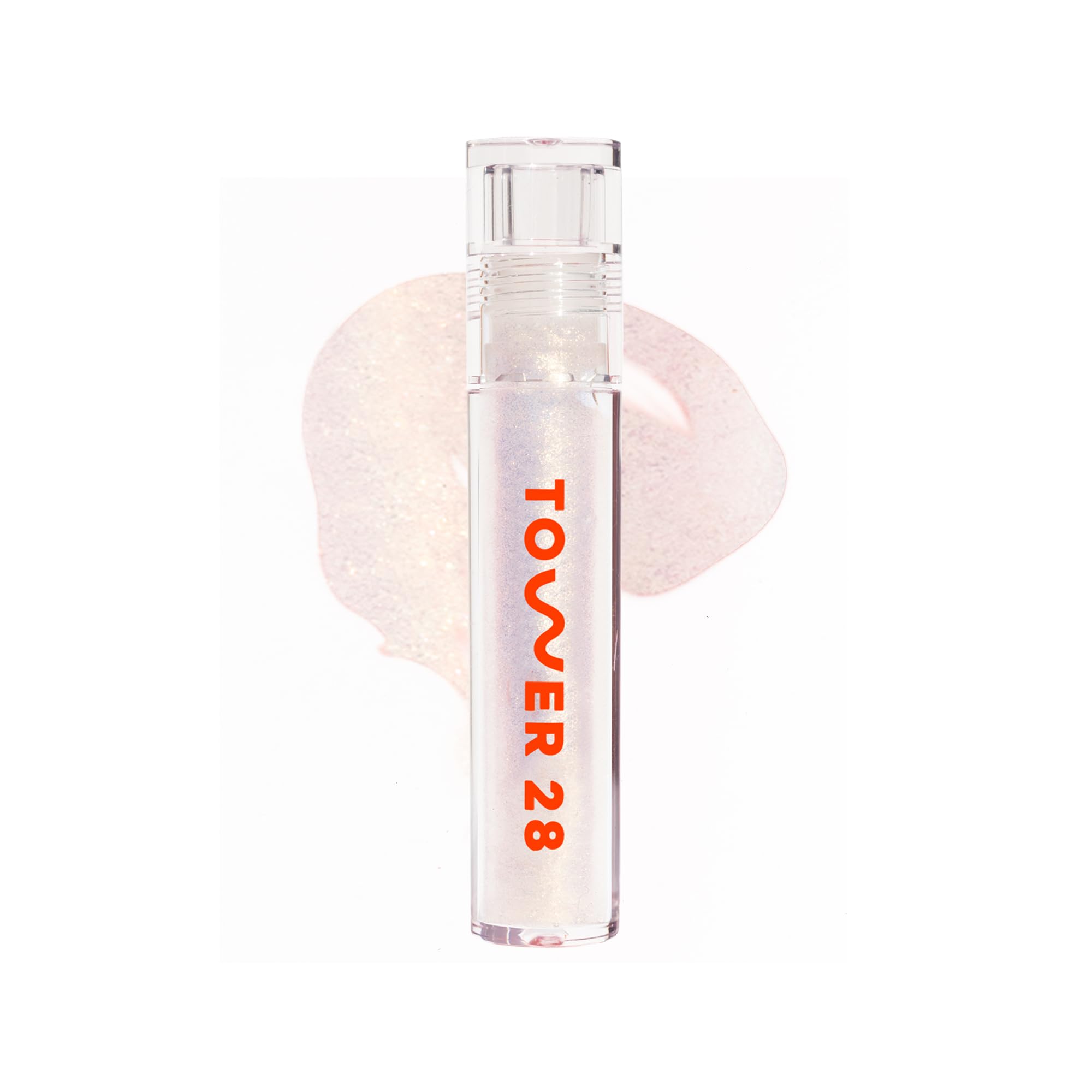 Tower 28 ShineOn Lip Jelly aplicación suave con brillo dorado sutil.