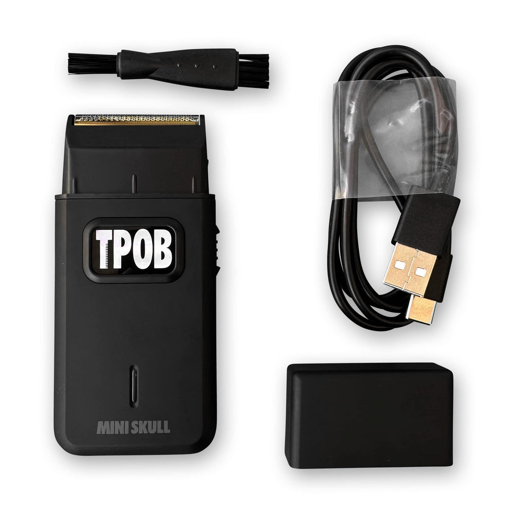 TPOB Afeitadora mini-cráneo con diseño compacto para el bolsillo.