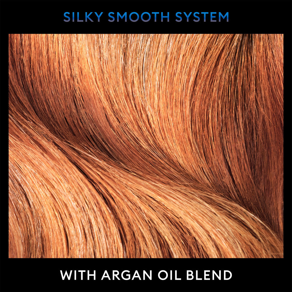 TRESemmé anti-frizz shampoo application shows frizz control.