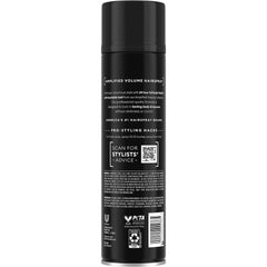 TRESemmé Total Volume hairspray being sprayed toward hair for even lift
