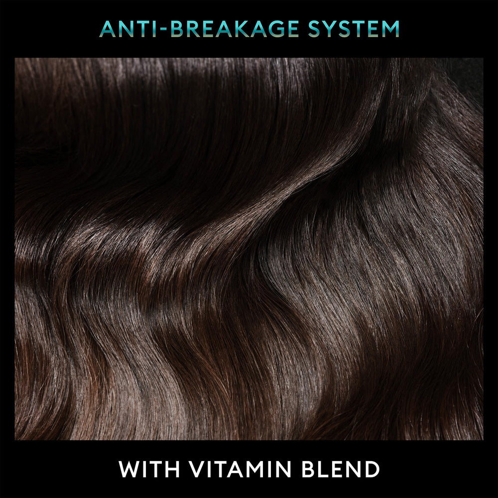 TRESemmé Vitamin Blend ingredients close-up indicating nourishing formula.