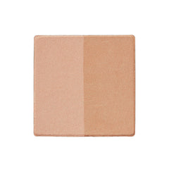 Trish McEvoy Dual Resort Bronzer Refill en compacto de dos niveles para un bronceado uniforme.