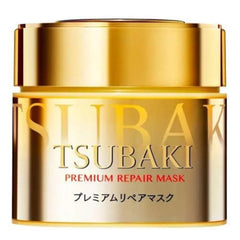 Tsubaki mascara reparacion premium 180g aplicada en cabello, hidrata y nutre profundamente.