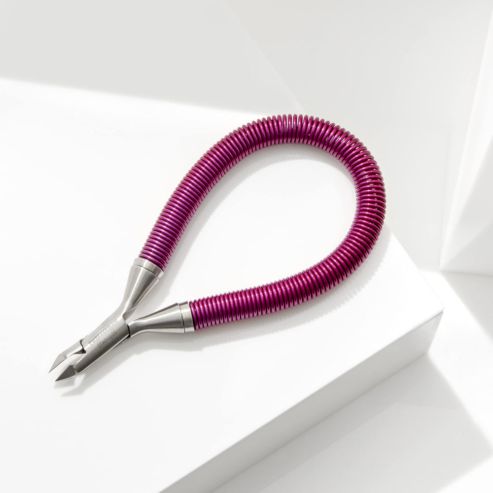 Tweezerman Grip & Snip espiral, recorte de forma precisa sin dañar la piel viva.