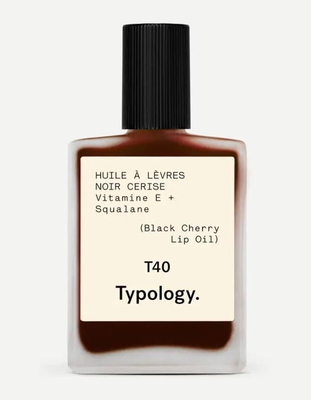 Typology Lip Oil, botella con color sutil y acabado brillante para labios.