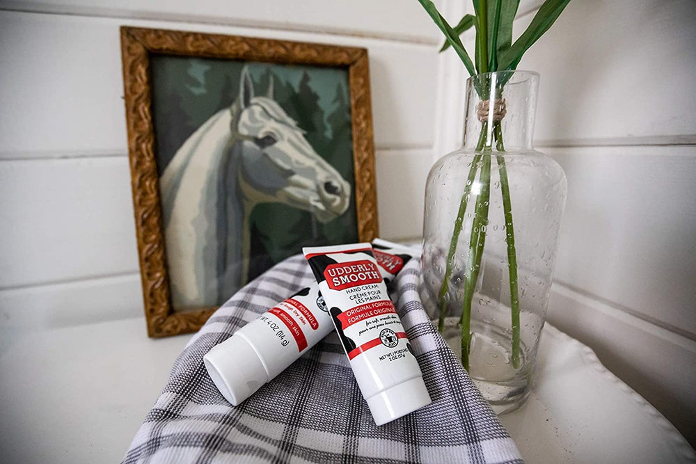 Udderly Smooth envase portátil de 4 oz para llevar