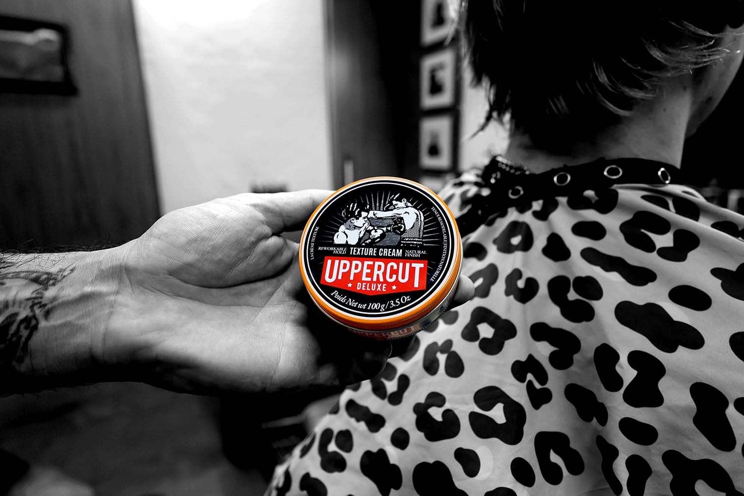 Uppercut Deluxe Texture Cream leather-shadow-scent adds refined grooming aroma.
