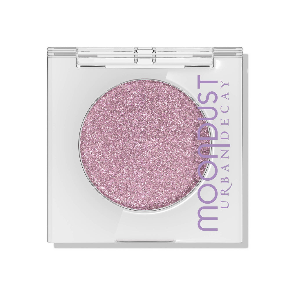 URBAN DECAY Moondust sombra glitter lila con efecto mojado y brillo intenso.