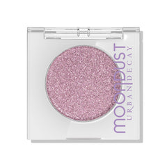 URBAN DECAY Moondust sombra glitter lila con efecto mojado y brillo intenso.