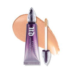 Urban Decay primer anti-edad, botella: base tono neutro para sombras suaves y duraderas.