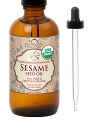 US Organic Aceite de sésamo sin tostar en botella ámbar con gotero, ideal para masaje suave.