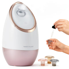 Vanity Planet Aira vaporizador facial rosado enfocado en limpieza de poros
