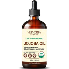 Botella de vidrio ámbar Velvoria Naturals con aceite de jojoba puro para piel y cabello